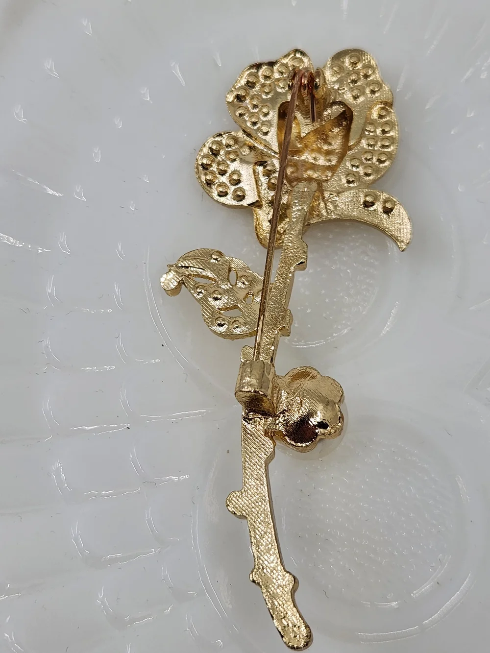 Gold Tone Crystal Rose Brooch with Faux Pearl Accent
